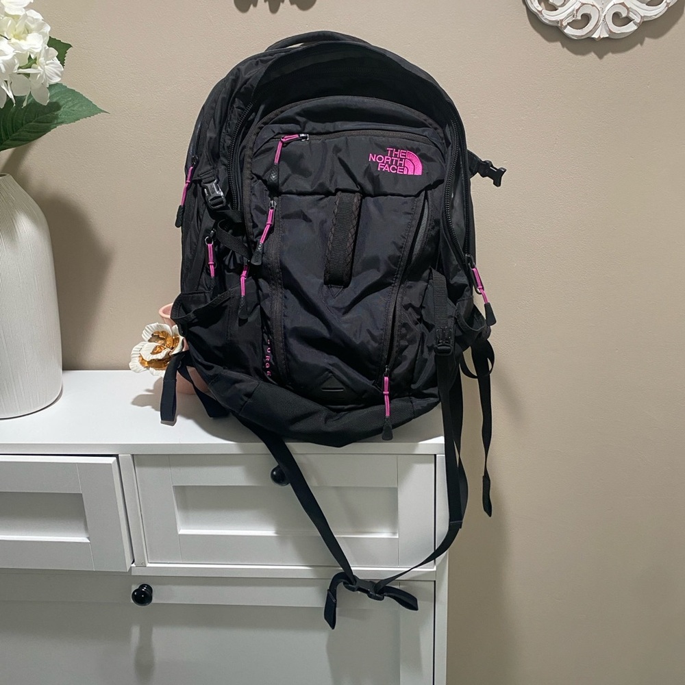 The North Face surge Black and Pink Backpack